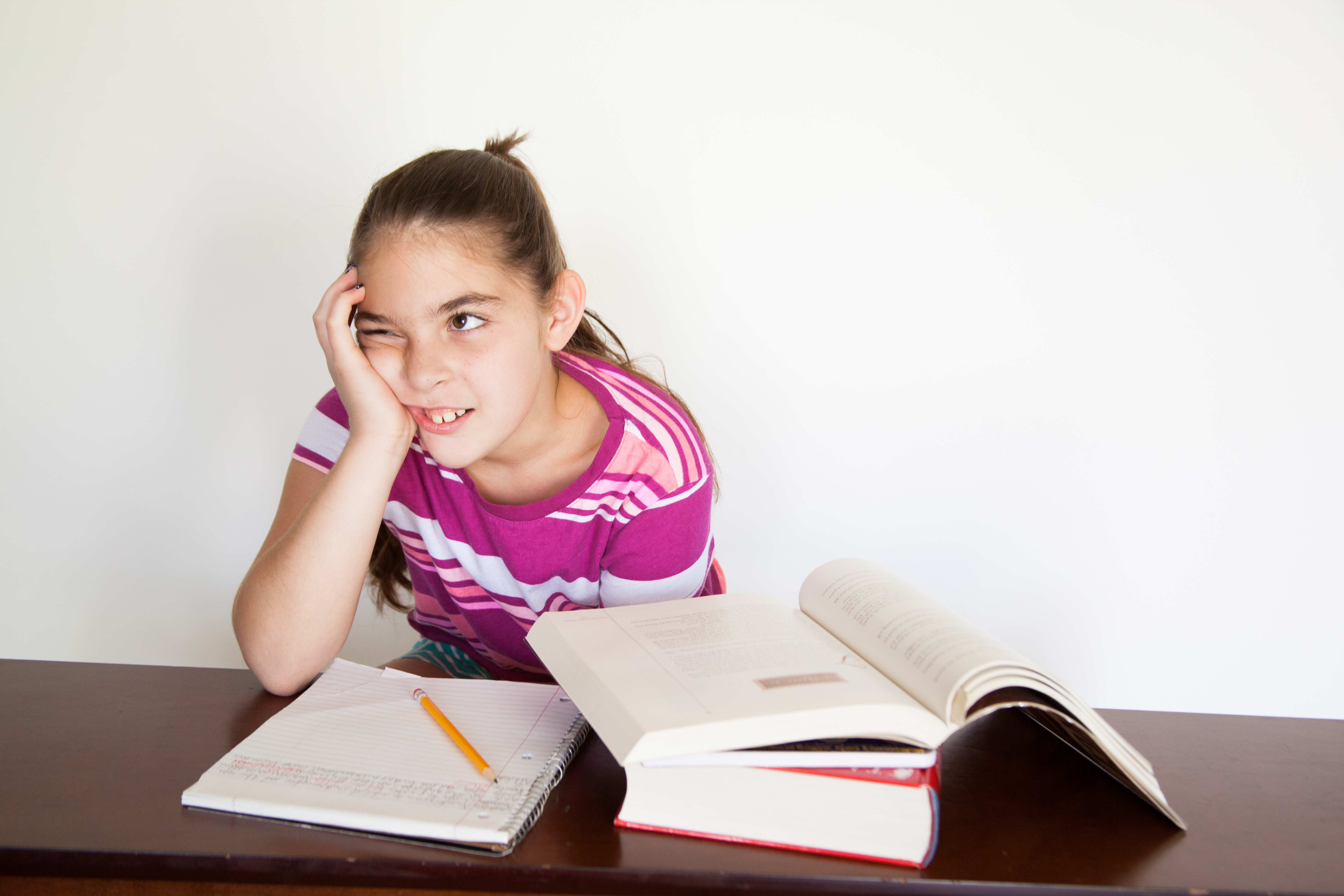 If this girl thinks that studying won’t help her do well on the test, her low self-efficacy may develop into learned helplessness.^[[Image](https://www.flickr.com/photos/125892716@N05/14419606327/in/photostream/) by [amenclinicsphotos](https://www.flickr.com/photos/125892716@N05/) ac is licensed under [CC BY-SA 2.0](https://creativecommons.org/licenses/by-sa/2.0/)]