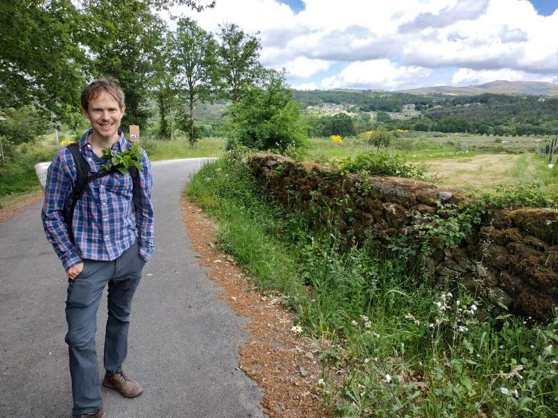 Robin in full 'peregrino' mode, complete with herbs given to us along the way.